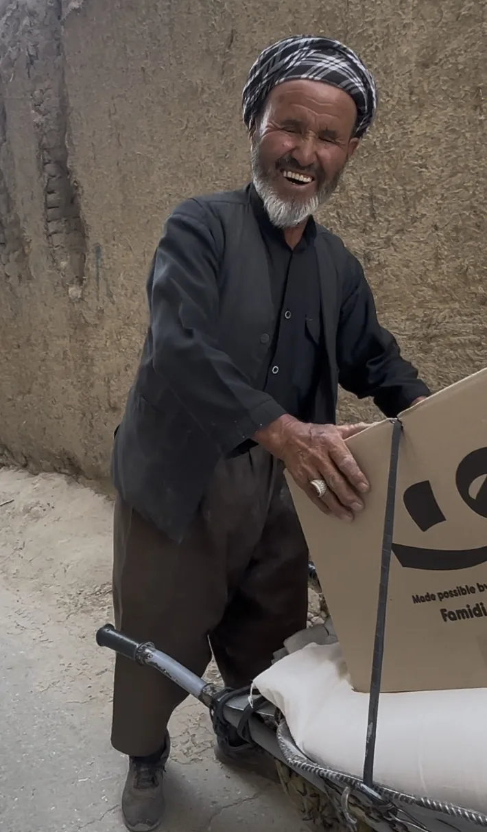 A Famidi food package being delivered with household staples